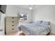 Cozy bedroom with a comfortable bed, ample natural light, and a view of the neighborhood at 11336 Bingham Ct, Orlando, FL 32837