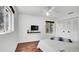 Bright bedroom with wood floors, a ceiling fan, a large window, and a spacious closet at 11336 Bingham Ct, Orlando, FL 32837