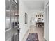 Inviting home entryway featuring tile flooring and a view of the dining and kitchen at 11336 Bingham Ct, Orlando, FL 32837