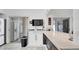 Updated kitchen featuring stainless steel appliances and a breakfast bar at 11336 Bingham Ct, Orlando, FL 32837