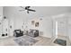 Bright living room with tile floors, neutral walls, and ample seating at 11336 Bingham Ct, Orlando, FL 32837