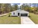Aerial view of the front of a new construction home with a dark grey roof at 12380 Sw 71St Lane Rd, Ocala, FL 34481