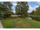 Scenic community grounds feature lush landscaping and a tranquil river view at 12527 Floridays Resort Dr # 401E, Orlando, FL 32821