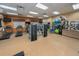 Well-equipped gym featuring treadmills, elliptical machines, and free weights for a complete workout at 12527 Floridays Resort Dr # 401E, Orlando, FL 32821