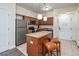 Well-equipped kitchen with modern appliances, a center island, and adjacent dining area at 12527 Floridays Resort Dr # 401E, Orlando, FL 32821