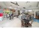 Bright cafe with tables and chairs at 12527 Floridays Resort Dr # 401E, Orlando, FL 32821