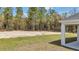 View of the treeline along back of property with green grass and clearing for future build at 12639 Sw 78Th Pl, Dunnellon, FL 34432
