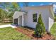 Charming exterior with well-manicured landscaping and an attached garage at 13274 Sw 82Nd Ln, Dunnellon, FL 34432