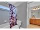 This bathroom features a tub/shower, and a vanity with a wood cabinet at 1420 Prairie Oaks Dr, St Cloud, FL 34771