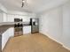 Spacious kitchen with stainless steel appliances and ample cabinet space at 1817 Christina Lee Ln, St Cloud, FL 34769