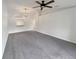 Bright and airy living room with neutral walls and plush carpeting at 1817 Christina Lee Ln, St Cloud, FL 34769