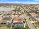 Community aerial view showcasing the home's location near a lake and well-maintained streets at 19313 Pummelo Dr, Orlando, FL 32827