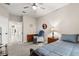 Cozy bedroom with a ceiling fan, neutral colors, and carpeted floors at 19313 Pummelo Dr, Orlando, FL 32827