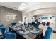 Elegant dining room showcasing stylish decor, with an open view into the living room at 19313 Pummelo Dr, Orlando, FL 32827