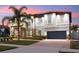 Beautiful two-story home with paver driveway, tile roof, stone accents and immaculate landscaping at 19313 Pummelo Dr, Orlando, FL 32827