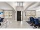 Grand foyer with soaring ceilings, arched entryways, and elegant tile flooring, with open floor plan at 19313 Pummelo Dr, Orlando, FL 32827