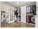 Organized walk-in closet with custom shelving and storage solutions at 19313 Pummelo Dr, Orlando, FL 32827