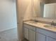 Bright bathroom showcases double vanity sinks and sleek modern design at 2005 Canton Park Dr, Winter Haven, FL 33881