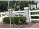 Canton Park community sign surrounded by lush landscaping and a white fence at 2005 Canton Park Dr, Winter Haven, FL 33881