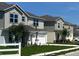 View of newly constructed homes in a well-maintained community with sidewalks at 2005 Canton Park Dr, Winter Haven, FL 33881