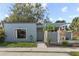 Inviting single-story home with well-maintained lawn, featuring a unique pergola and tidy landscaping at 2539 Antilles Dr, Winter Park, FL 32792