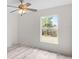 Bright, airy bedroom with a large window overlooking the backyard at 2540 Courtland Blvd, Deltona, FL 32738