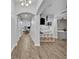 Bright, open-concept home interior showcasing hardwood floors and decorative archways at 2940 Scarlett Dr, St Cloud, FL 34772