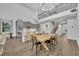 Open-concept kitchen and dining area with modern finishes and lots of natural light at 2940 Scarlett Dr, St Cloud, FL 34772