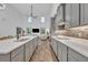 Modern kitchen with sleek countertops, stainless steel appliances, and modern backsplash at 2940 Scarlett Dr, St Cloud, FL 34772
