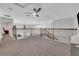 An open loft area overlooks the floor below with lots of natural light at 2940 Scarlett Dr, St Cloud, FL 34772