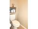 Clean bathroom with a standard toilet and a storage basket; simple and functional at 3039 Boating Blvd. Blvd, Kissimmee, FL 34746