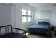 Bright bedroom with two beds and natural light streaming through the windows at 3039 Boating Blvd. Blvd, Kissimmee, FL 34746