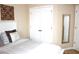 Cozy bedroom with soft bedding, decorative pillows, and a full-length dressing mirror at 3039 Boating Blvd. Blvd, Kissimmee, FL 34746