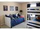 Cozy bedroom with daybed, bunkbeds, and nautical-themed decorations at 3039 Boating Blvd. Blvd, Kissimmee, FL 34746