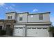 Charming two-story home featuring a two-car garage and a stone facade accent at 3039 Boating Blvd. Blvd, Kissimmee, FL 34746