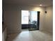 A view from one room to another with sliding doors, showing a glimpse of the adjacent space at 3039 Boating Blvd. Blvd, Kissimmee, FL 34746