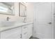 Bathroom featuring double vanity with white vessel sinks and a framed mirror at 31905 Larkspur Ave, Eustis, FL 32736