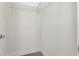 Empty walk-in closet with a wire shelving system, neutral walls, and wood-look floors ready for organization at 31905 Larkspur Ave, Eustis, FL 32736
