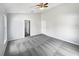 Spacious bedroom with vaulted ceiling, plush carpet, and neutral paint at 332 Lake Doe Blvd, Apopka, FL 32703