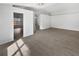Open floor plan with wood flooring, neutral walls, and ample natural light at 332 Lake Doe Blvd, Apopka, FL 32703