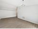 Living room featuring gray walls, wood flooring, and neutral trim at 332 Lake Doe Blvd, Apopka, FL 32703
