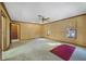 Bright bedroom with carpet flooring, ceiling fan, and neutral wall color at 342 Oak Estates Dr, Orlando, FL 32806