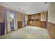 Bedroom with built-in cabinets, wainscoting, wallpaper and two large windows at 342 Oak Estates Dr, Orlando, FL 32806