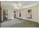Bedroom with three bright windows, a ceiling fan and neutral paint at 342 Oak Estates Dr, Orlando, FL 32806