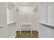 Walk-in closet with built-in shelving and ample storage space at 342 Oak Estates Dr, Orlando, FL 32806