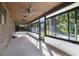 Enclosed sunroom featuring multiple windows, wood ceiling and fan, bright and open layout with lots of natural light at 342 Oak Estates Dr, Orlando, FL 32806