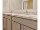 Bathroom featuring double vanity with granite countertops and modern fixtures at 39 Hickory Course Way, Ocala, FL 34472