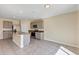 Kitchen boasts stainless steel appliances, granite countertops, and a functional island for meal prep at 39 Hickory Course Way, Ocala, FL 34472