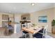 Bright eat-in kitchen featuring stainless appliances, granite counters and an island with bar seating at 39 Hickory Course Way, Ocala, FL 34472