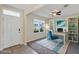 Bright office featuring a large window with neighborhood views and custom built-ins at 39 Hickory Course Way, Ocala, FL 34472